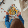 kid eating oranges